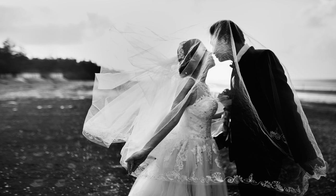 A tender kiss in black and white
